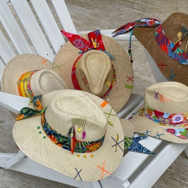 a group of hats on a chair
